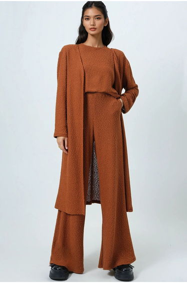 Women's cinnamon-colored crew neck textured blouse, padded shoulder pants, and cardigan 3-piece set