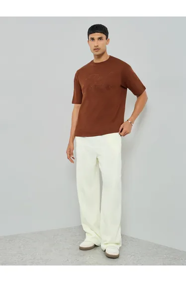 Men Cream Solid Relaxed Fit Joggers