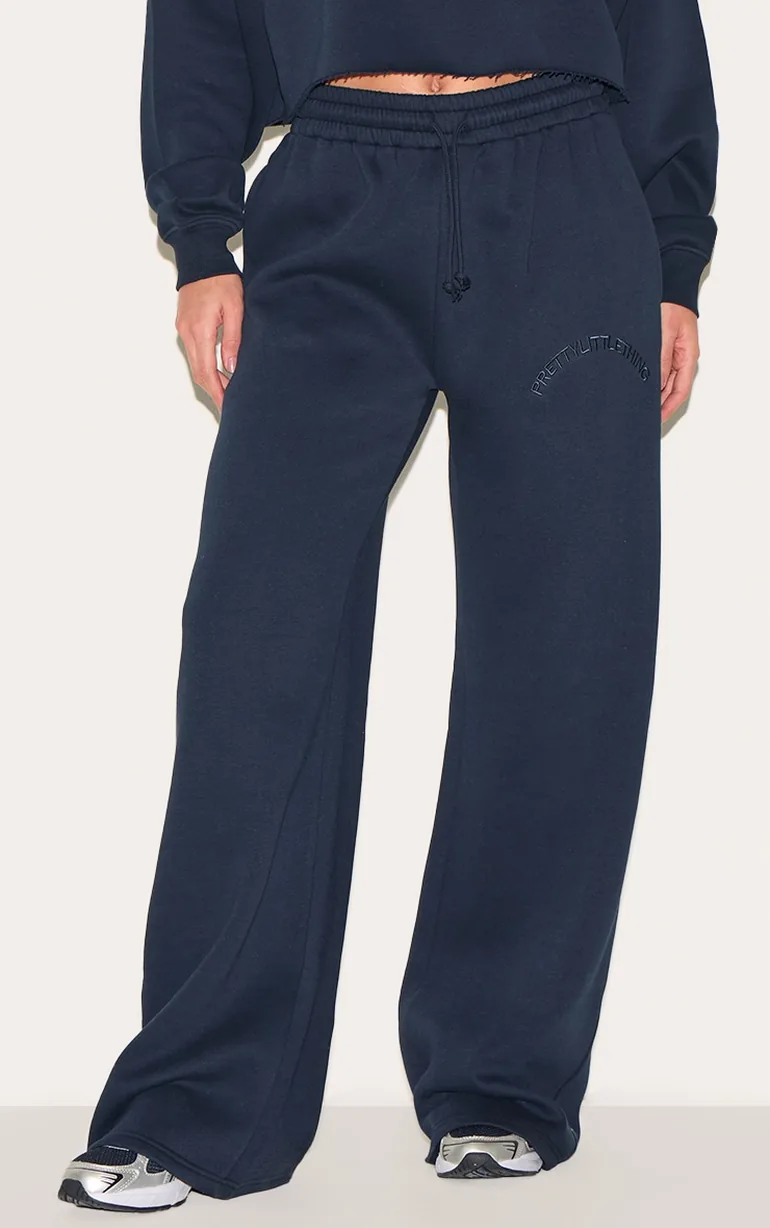 بنطلون رياضي بأرجل عريضة برباط شد لون كحلي - طويلات القامة - 1