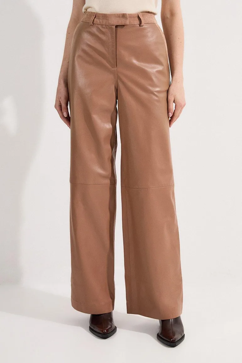 بنطلون جلد و شمواة بأرجل عريضة - 1