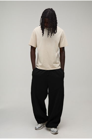 Extreme Wide Leg Exposed Seam Toggle Hem Jogger - black