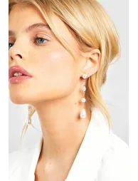 أقراط متدلية لون أبيض