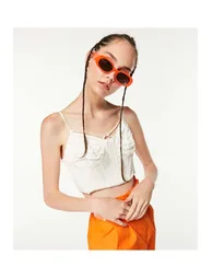 White Cropped Sleeveless Blouse