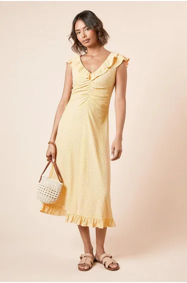 فستان ميدي مزموم بياقة بكشكش بطبعة منقطة لون أصفر