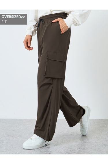 Women Brown Plain Oversized Parachute Pants with Utility Pockets