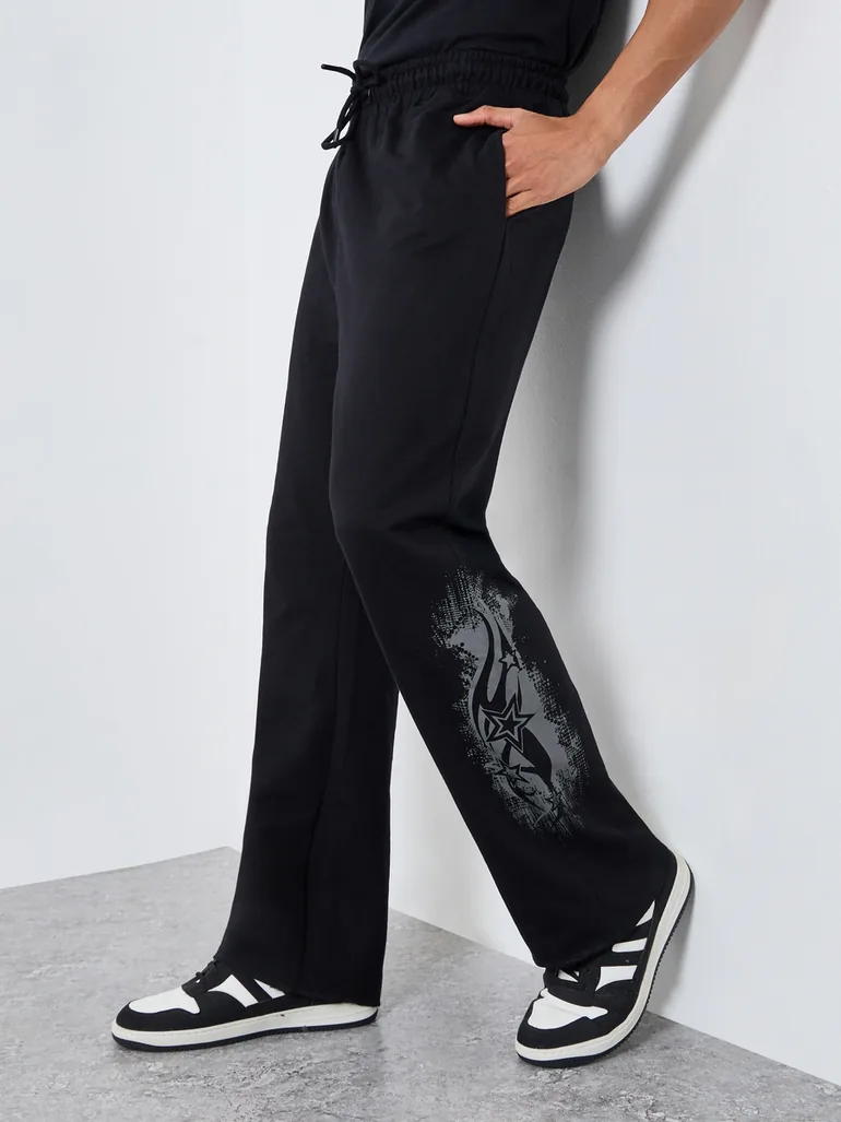 Men Black Printed Oversized Joggers - 1