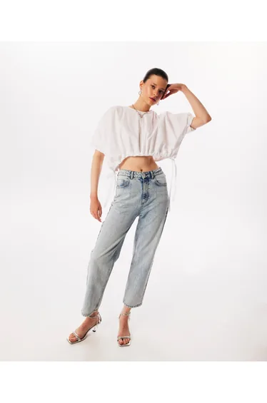 There is a tie-dye crop top blouse