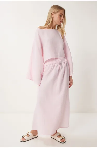 طقم تنورة و بلوزة نسائي موسلين لون زهري