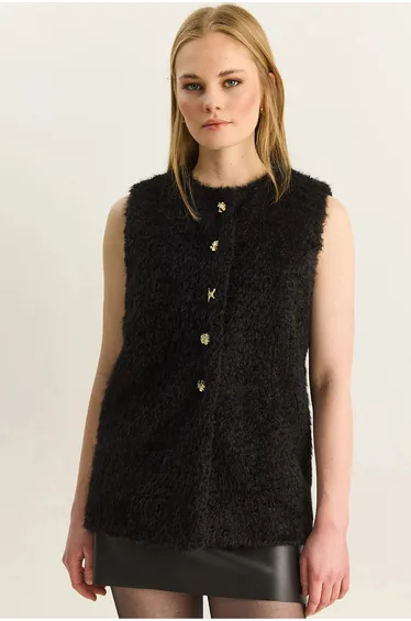 صدرية بأزرار إغلاق