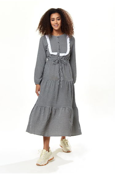 Women's Midi Dress in Black and White Gingham with Long Sleeves.
