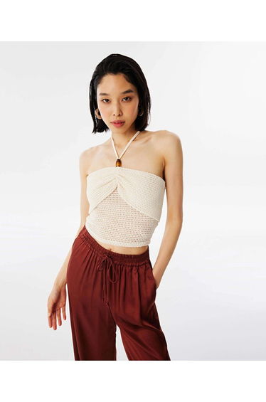 Textured t-shirt with bead accessories