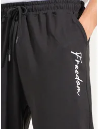 Men Text Print Oversized Joggers - 2