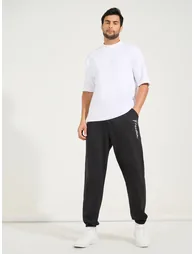 Men Text Print Oversized Joggers