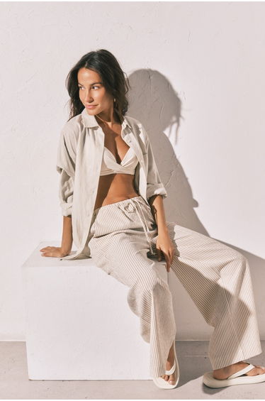 Beige long trousers