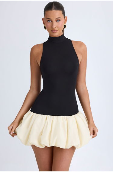 Turtleneck Drop-Waist Bubble Hem Mini Dress in Black