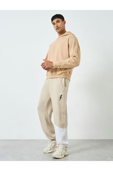 Men Beige Color Block Joggers with Drawstring
