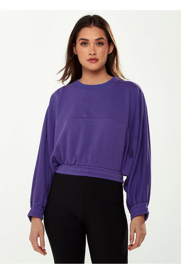 Women's Cropped Sweatshirt in Purple with Unique Bat and Balloon Sleeves.