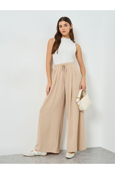 Beige Wide Leg Pleated Trousers