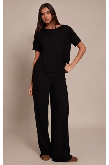 بنطلون شفاف بأرجل عريضة - أسود