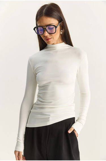 LUCCI Fitted Turtleneck Long Sleeve Blouse with Ruffle Detail