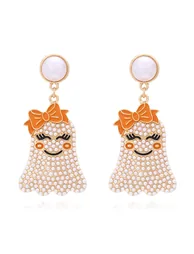 Smiling Ghost Pearl Bow Earrings