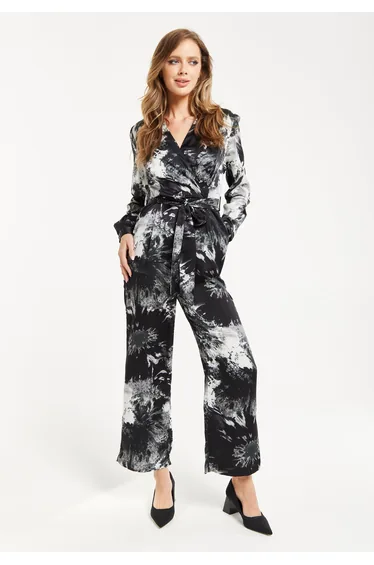 Women's Mono Abstract Print Long Sleeve Jumpsuit with Crossover Front and Tie Waist.