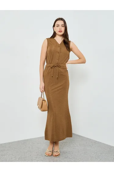 Women Beige Textured Straight Maxi Skirt