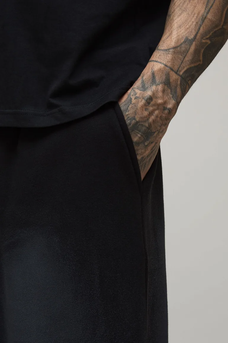 بنطلون رياضة بوهو مان أسود بقصة عريضة - للمقاسات الطويلة - 2