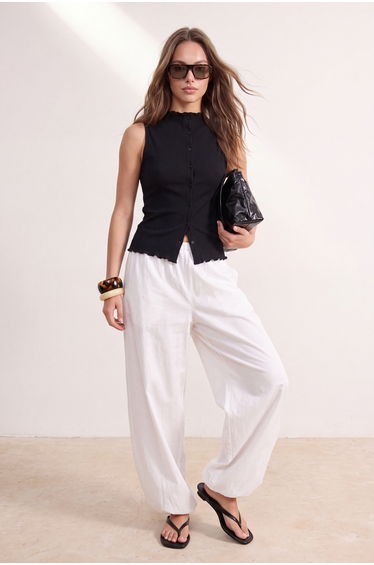 Wardrobe Essentials-Black Fitted/Grapefruit Buttoned Ruffle Stretch Knit Blouse
