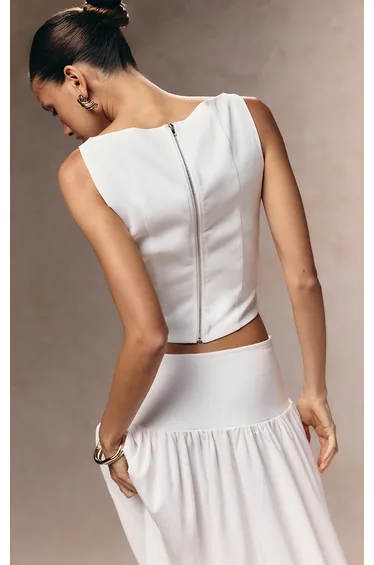 صدرية بأزرار لون أبيض 