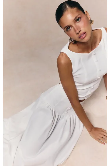 صدرية بأزرار لون أبيض 