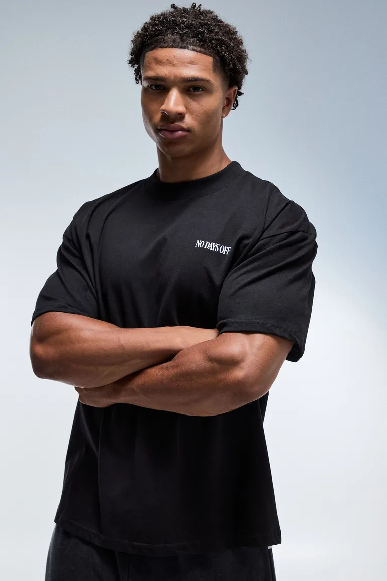 Man Active Earned Not Given Oversized Extended Neck T-Shirt - black