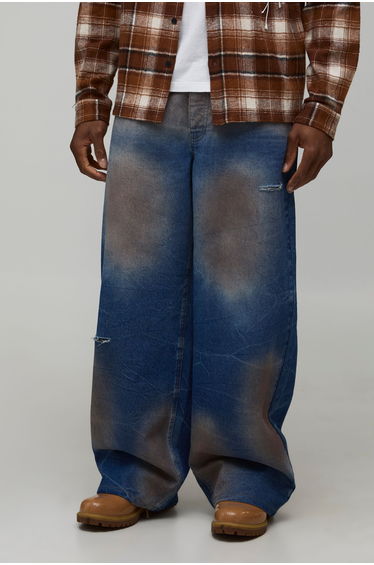 Baggy Fit Tinted Ripped Jeans - mid wash