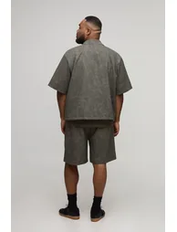 طقم شورت و قميص بتصميم واسع بطبعة رخامية لون أخضر - للمقاسات الكبيرة - 1