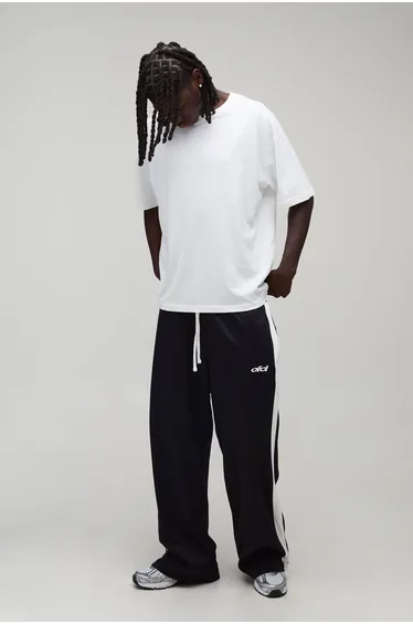 Wide Leg Embroidered Tricot Jogger - black