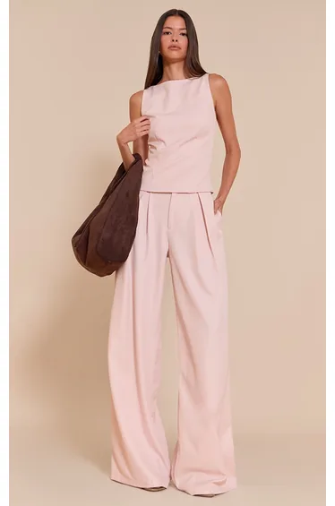 بنطلون بأرجل عريضة لون زهري