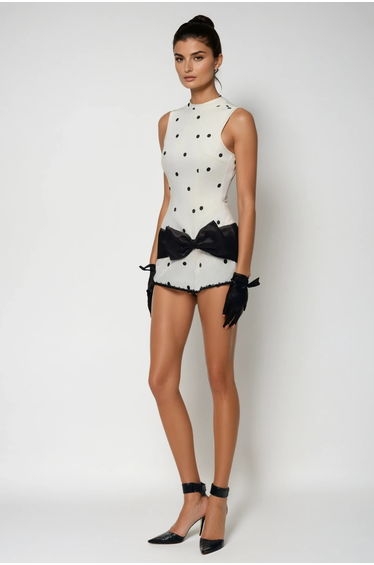 Deja Sleeveless Dot Bow Mini Dress