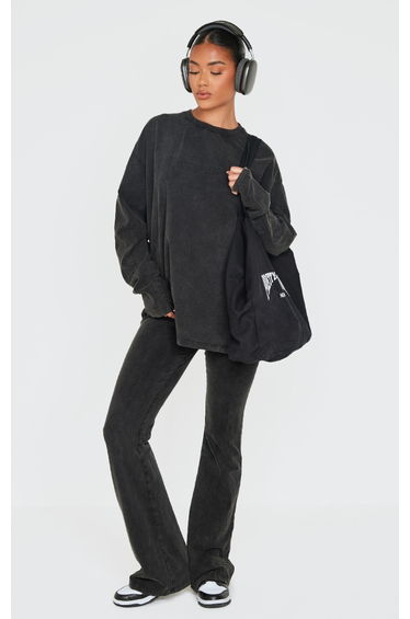 PRETTYLITTLETHING Black Embossed Logo Washed Skinny Flare Trousers