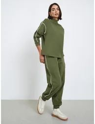 Women Green Plain Relaxed Fit Joggers with Piping Detail