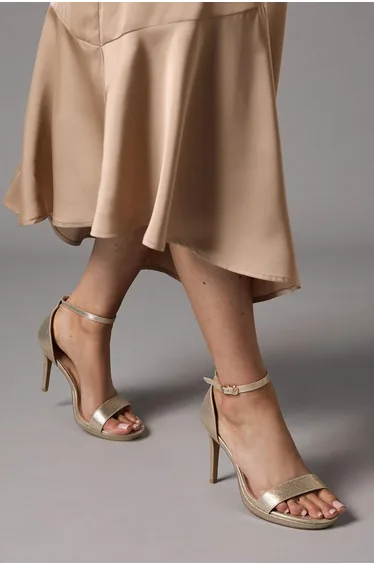 صندل كعب عالي ميتاليك بنعل بلاتفورم