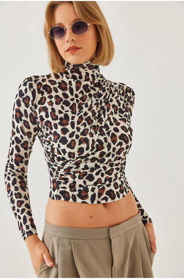 LUCCI Fitted Turtleneck Blouse with Ruffle Detail