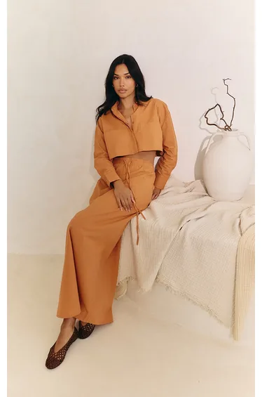 تنورة ماكسي برباط شد لون برتقالي