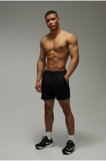 Man Active Stretch Woven Bungee Adjuster 7inch Shorts - black