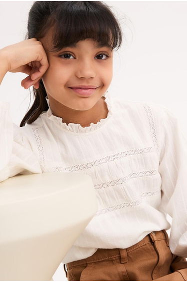 Victorian Collar Blouse with Embroidered Details and Long Sleeves