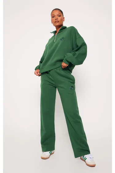 بنطلون رياضي بأرجل عريضة بشعار مطرز 