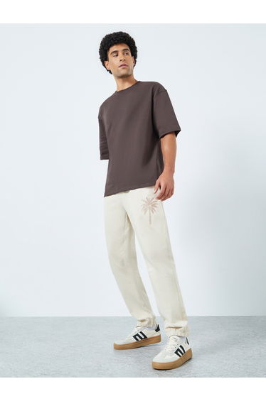 Men Khaki Embroidered Palm Tree Joggers