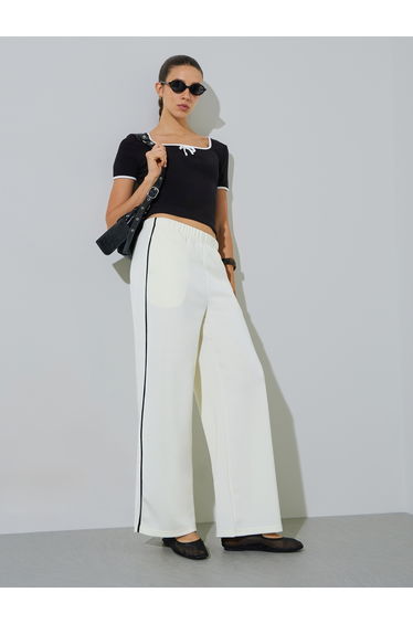 Cream Wide Leg Joggers with Side Seam Piping