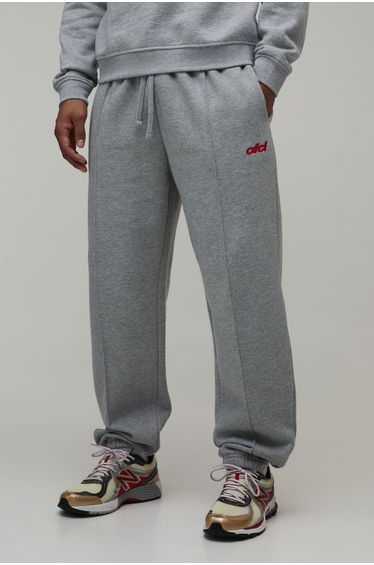 Regular Fit Exposed Seam Embroidered Cuffed Jogger - grey marl