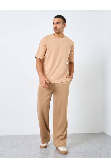 Men Beige Text Printed Oversized Jersey T-Shirt