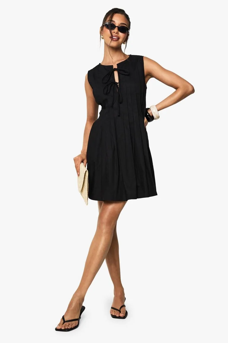 black cotton swing dress Black Cotton Swing Dress With Polk-a-dot Lining and Side Pockets
